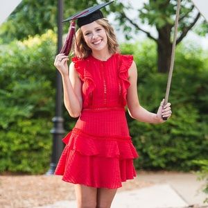 Red mini dress with ruffles and high neck